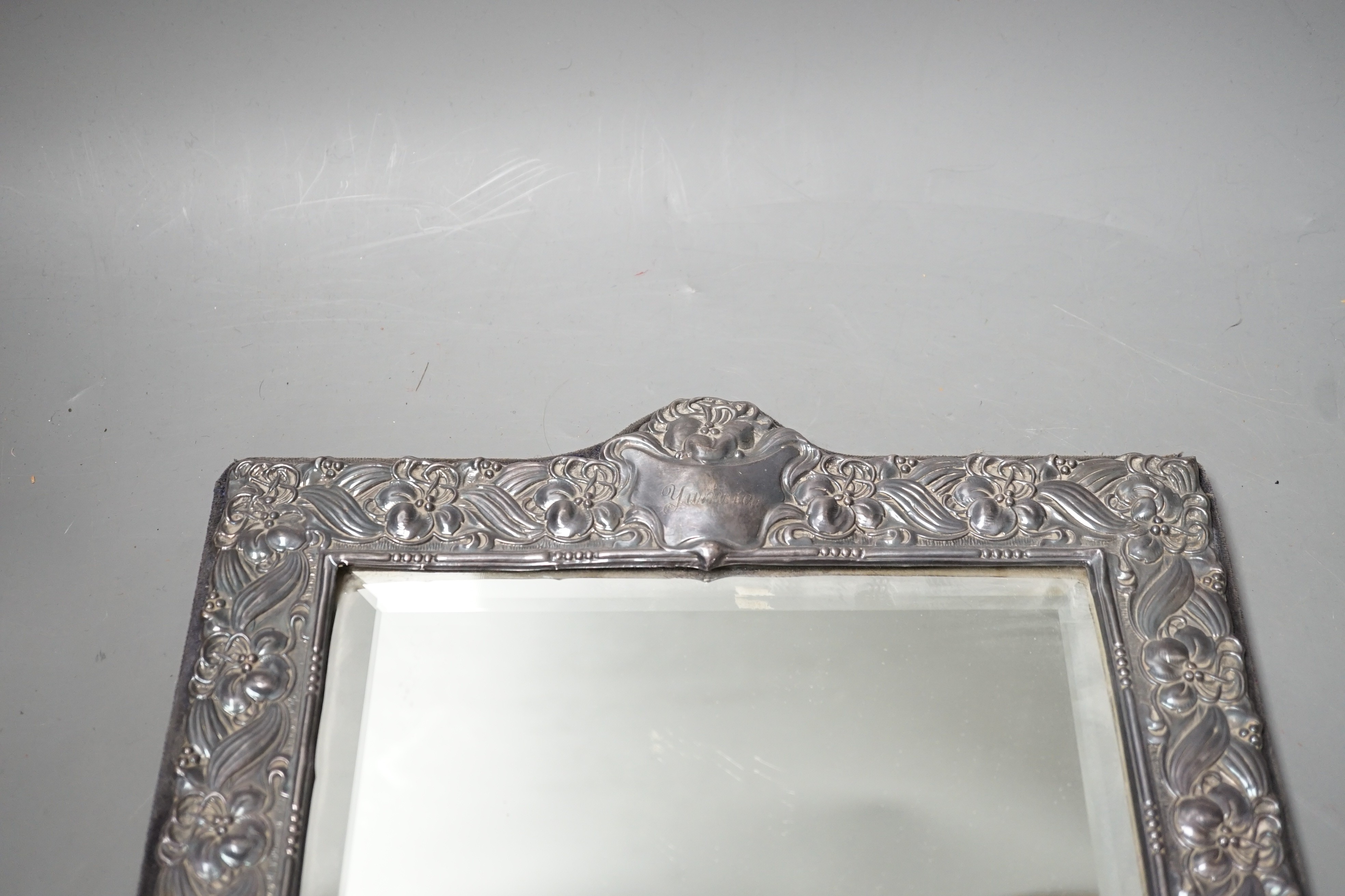 A modern repousse silver mounted rectangular photograph frame, Keyford Frames Ltd, London, 1988, 36.6cm.